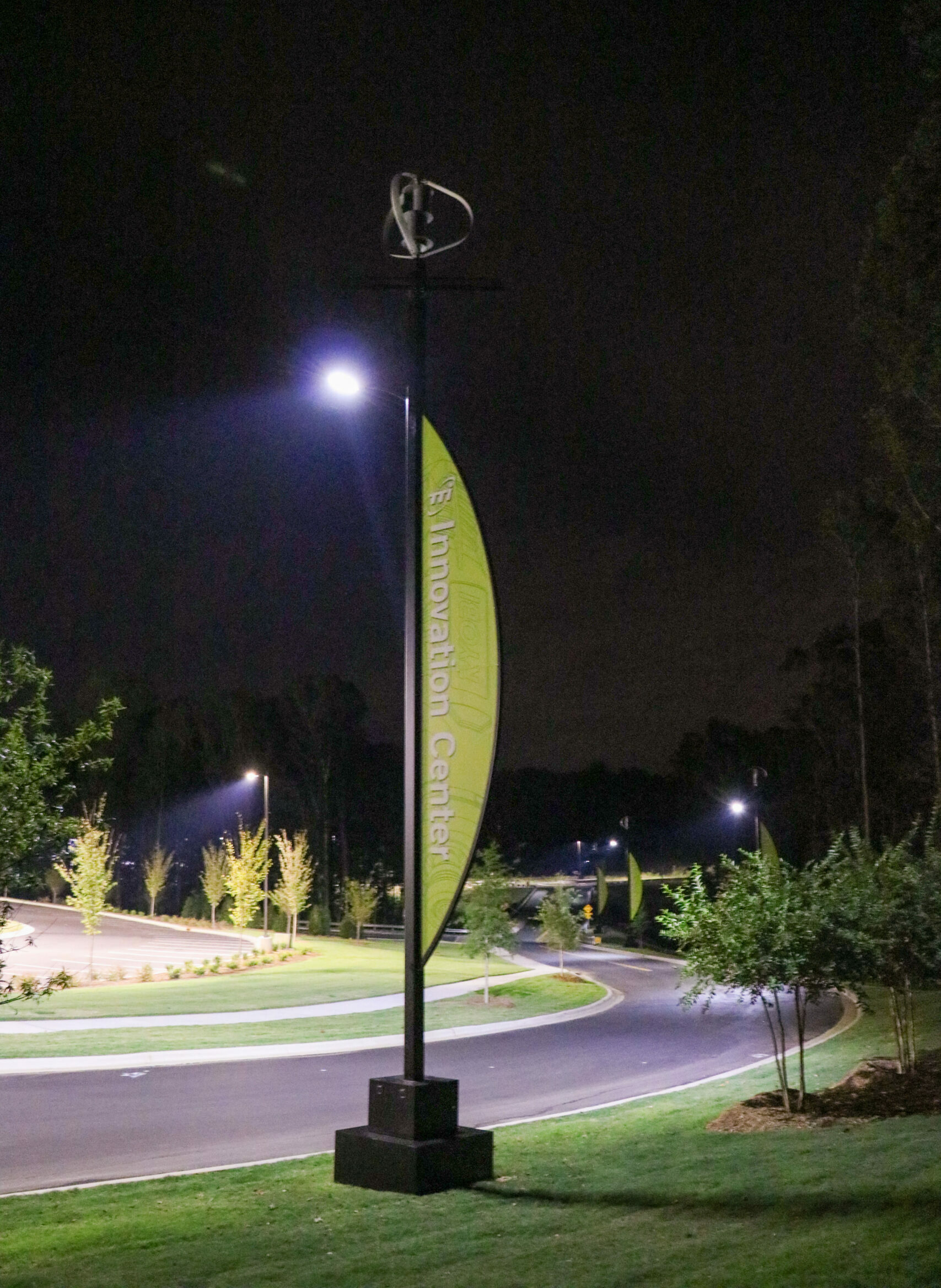 off-grid Solar and Wind Powered parking lot lights with custom signage